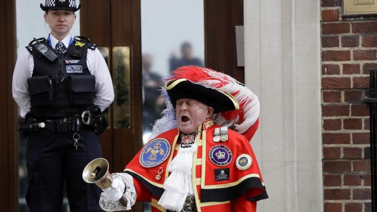 Town Crier Tony Appleton is seen making the announcement.
