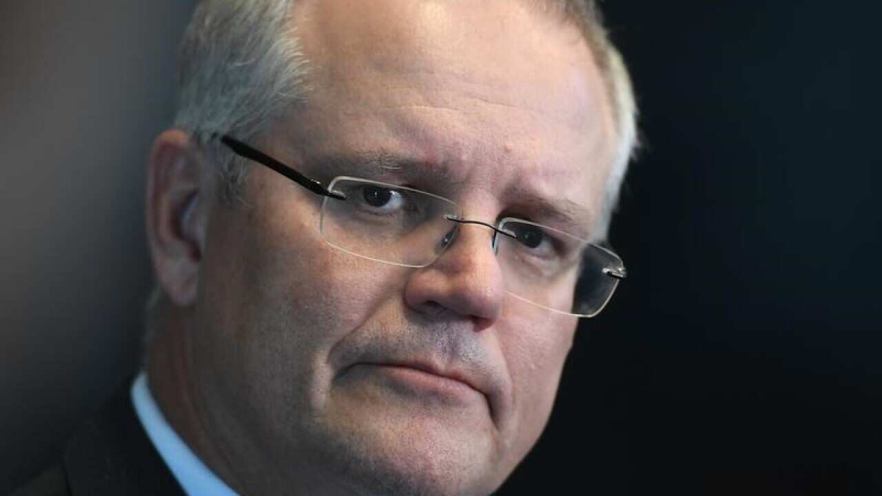 Federal Treasurer Scott Morrison speaks to the media.