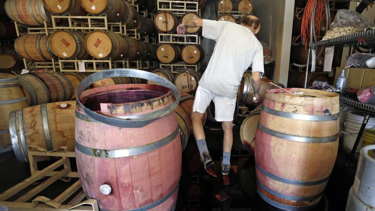 Tom Montgomery inspects damage following an earthquake in Napa