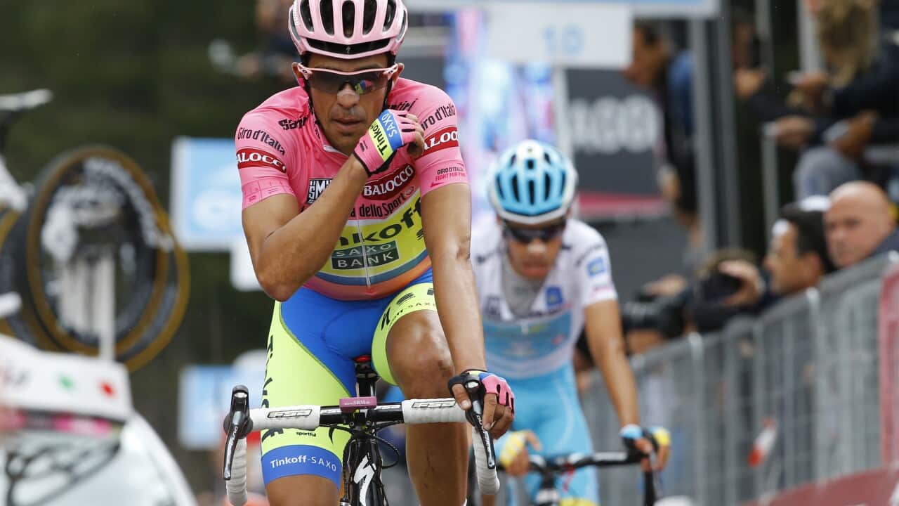 Alberto Contador crosses the finish line ahead of Fabio Aru on Stage 15 of the Giro d'Italia.