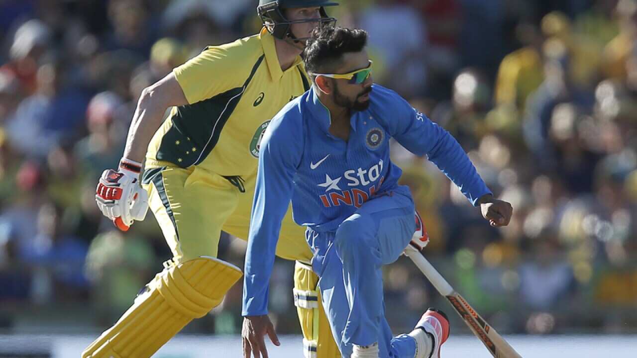 India's Virat Kohli, right, and Australia's Steve Smith