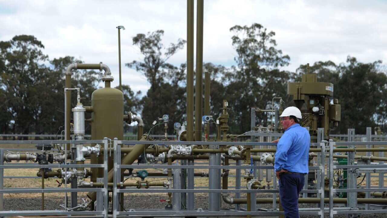Santos staff at the Tinsfield coal seam gas pilot well in Narrabri