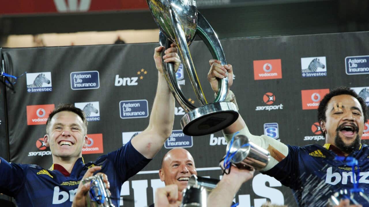 Co captains Highlanders' Ben Smith, left and Nasi Manu hold the trophy