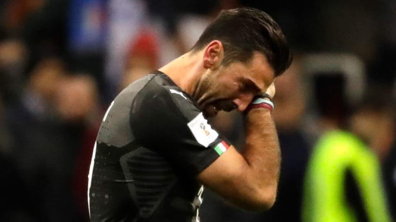 Italy goalkeeper Gianluigi Buffon cries after his team got eliminated in the World Cup qualifying play-off second leg soccer match between Italy and Sweden, at the Milan San Siro stadium, Italy, Monday, Nov. 13, 2017. (AP Photo/Luca Bruno)