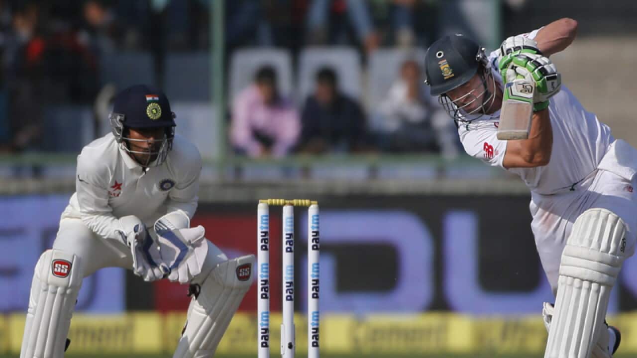 South African batsman AB de Villiers (R) plays a shot against India