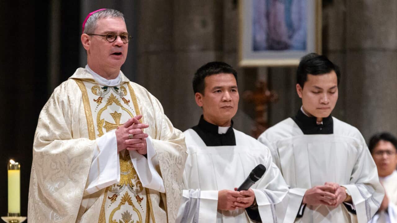 The Archbishop of Melbourne, Peter Comensoli celebrating Mass