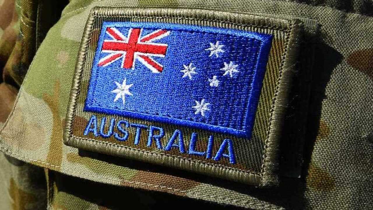 The Australian flag on an Australian Defence Force uniform (AAP/Dave Hunt)