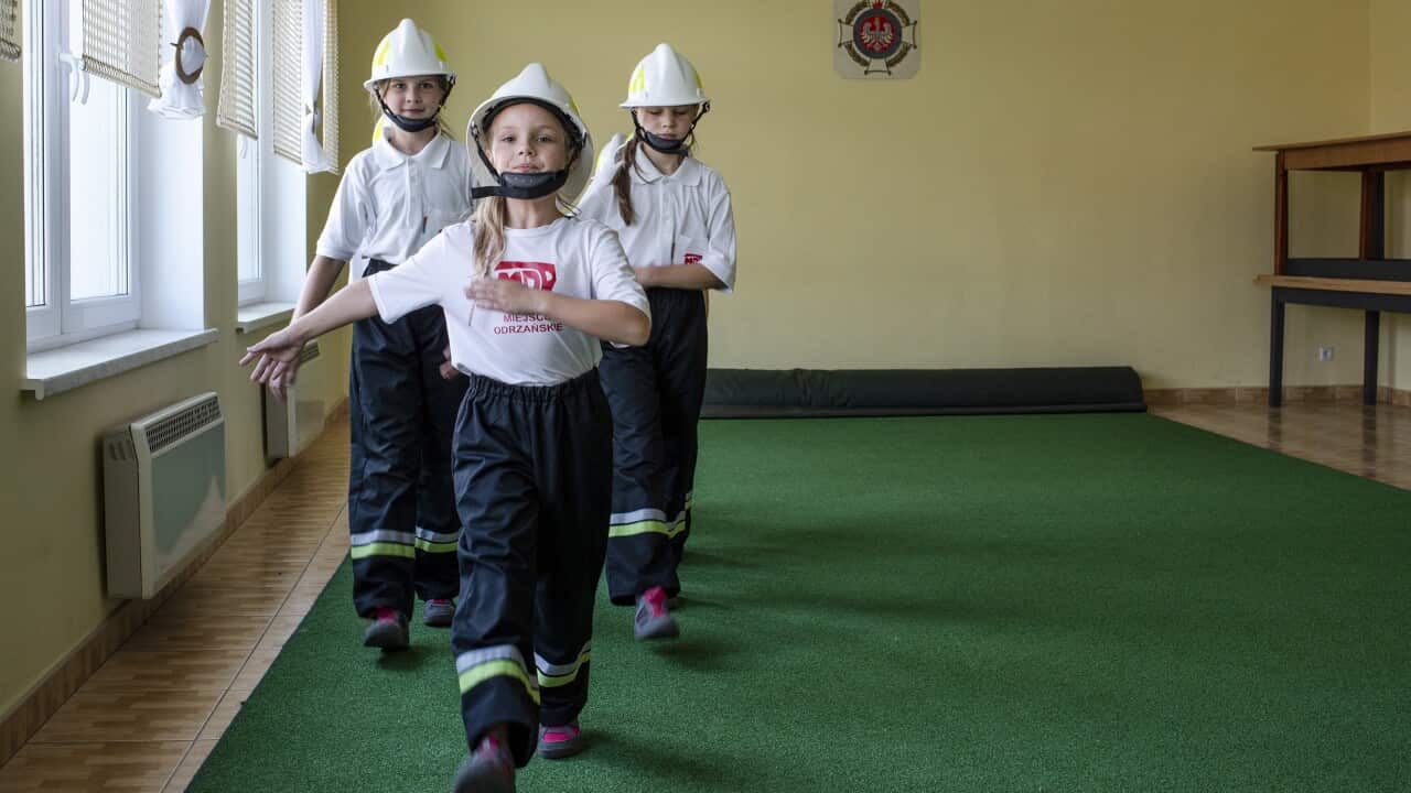 The all-girl young volunteer firefighters team in the village of Miejsce Odrzanskie, Poland, Aug. 1, 2019. (Kasia Strek/The New York Times)