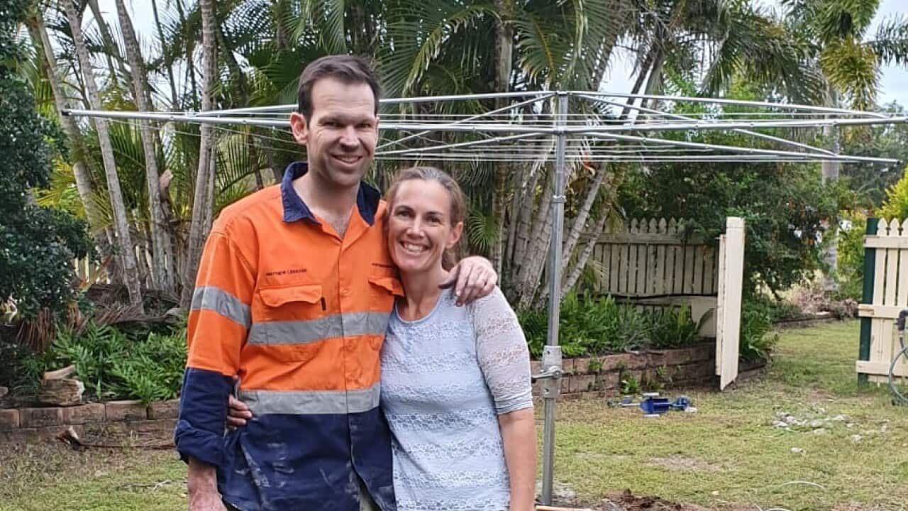Matt Canavan poses with the clothesline he bought his wife for Mother's Day