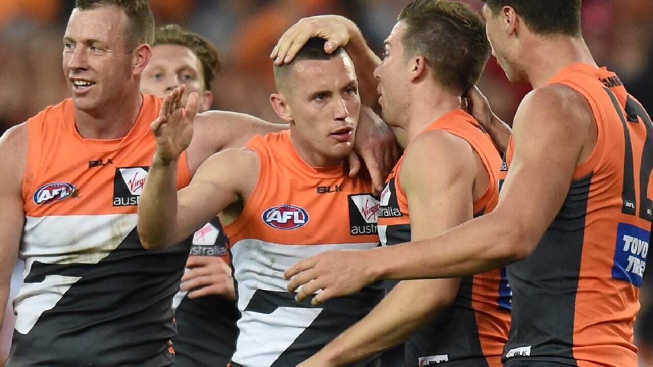 Tom Scully of the Giants celebrates a goal