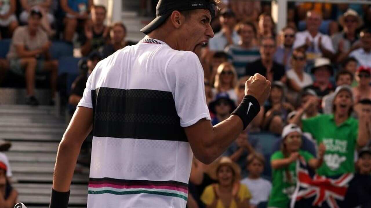 Alexei Popyrin of Australia in action against Mischa Zverev.