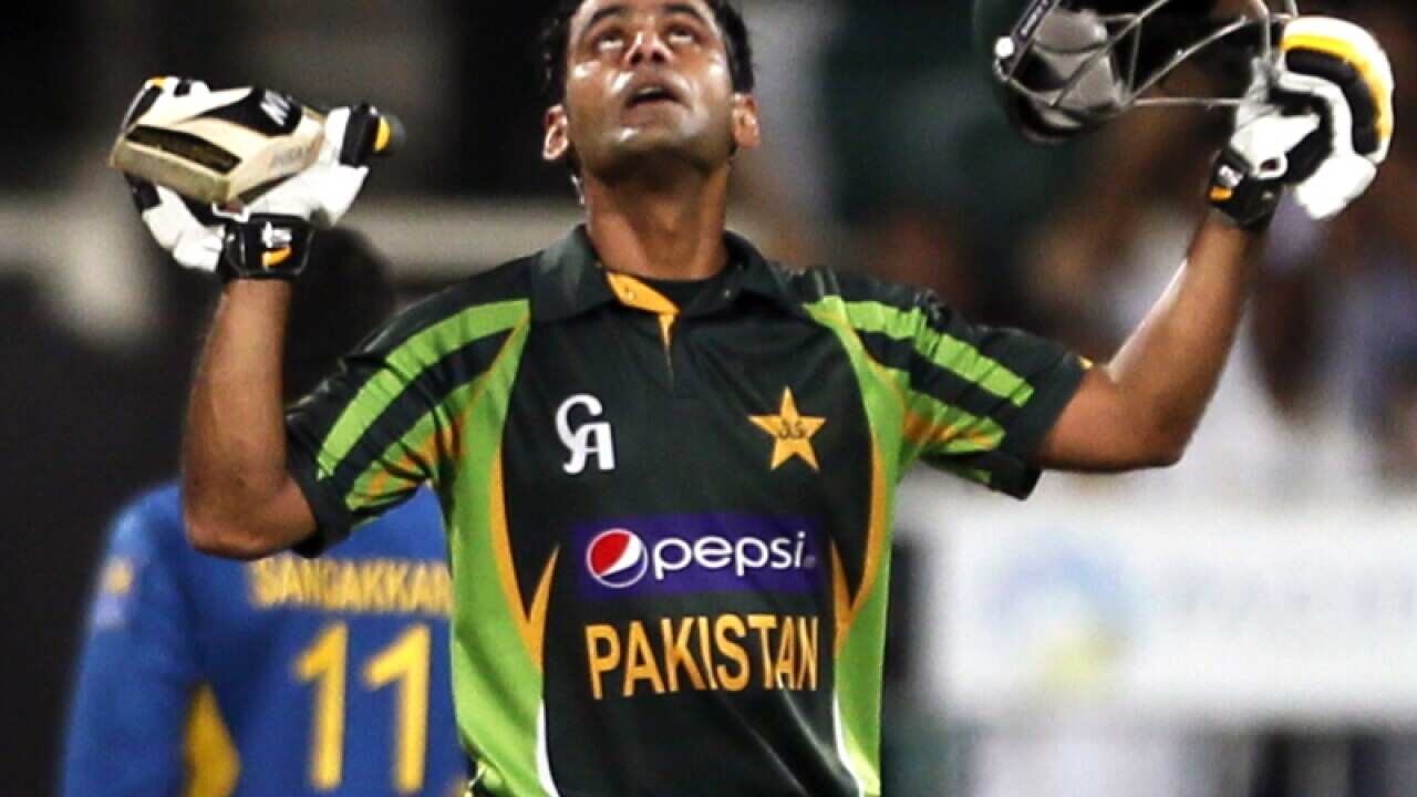 Pakistan batsman Mohammad Hafeez celebrates hitting a century