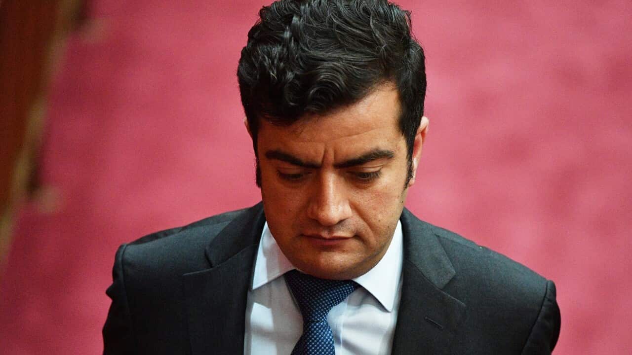 Labor Senator Sam Dastyari leaves after Question Time in the Senate chamber at Parliament House in Canberra, Tuesday, December 5, 2017. (AAP Image/Mick Tsikas) NO ARCHIVING