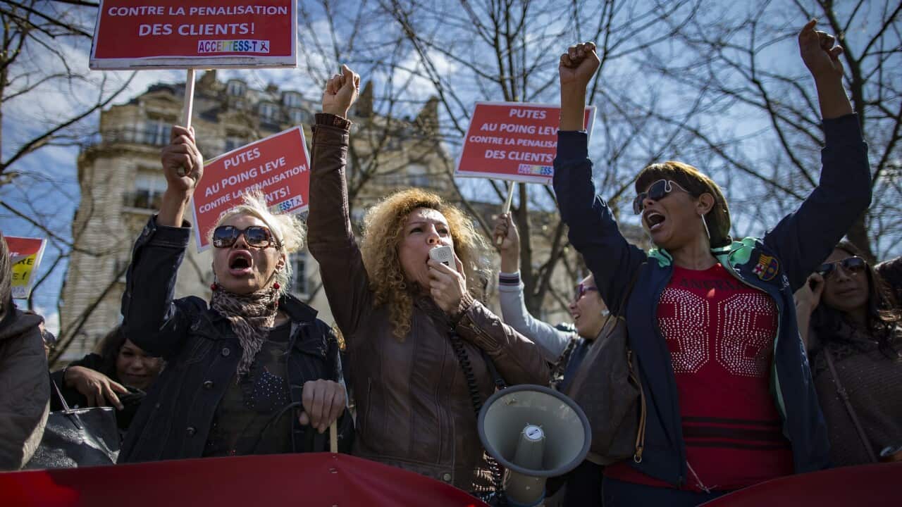 Transgender sex workers protest against a parliamentary vote to enforce the penalisation of solicitation on April 6, 2016