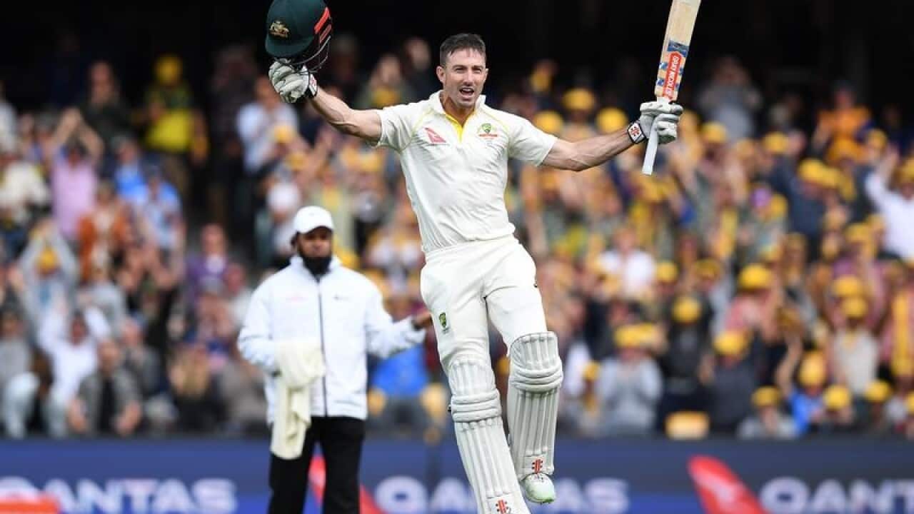 Australian batsman Shaun Marsh celebrates after scoring a century.