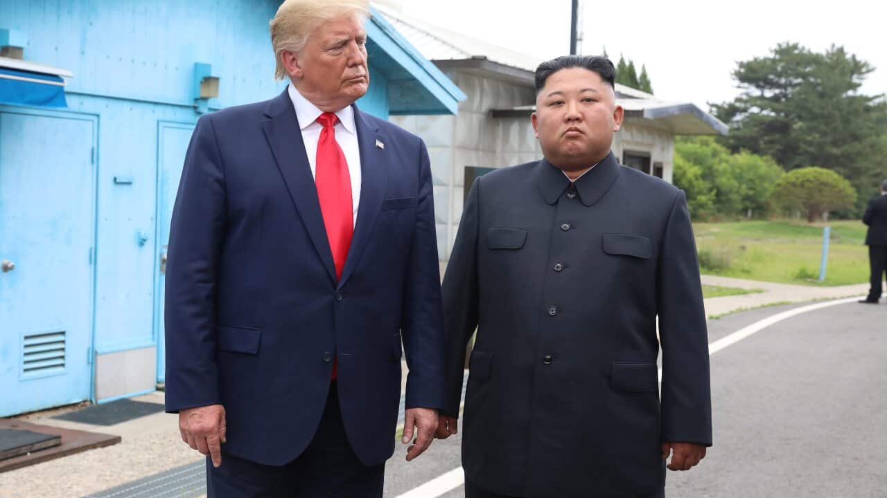 North Korean leader Kim Jong Un and U.S. President Donald Trump inside the demilitarized zone (DMZ) separating the South and North Korea.