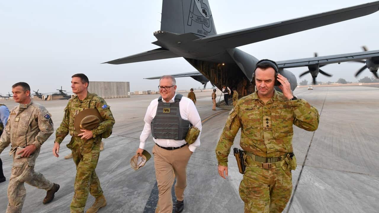 Australian Prime Minister Scott Morrison is seen during a visit to Task Group Taji at Taji Military Complex in Iraq, Wednesday, December 19, 2018. (AAP Image/David Mariuz) NO ARCHIVING