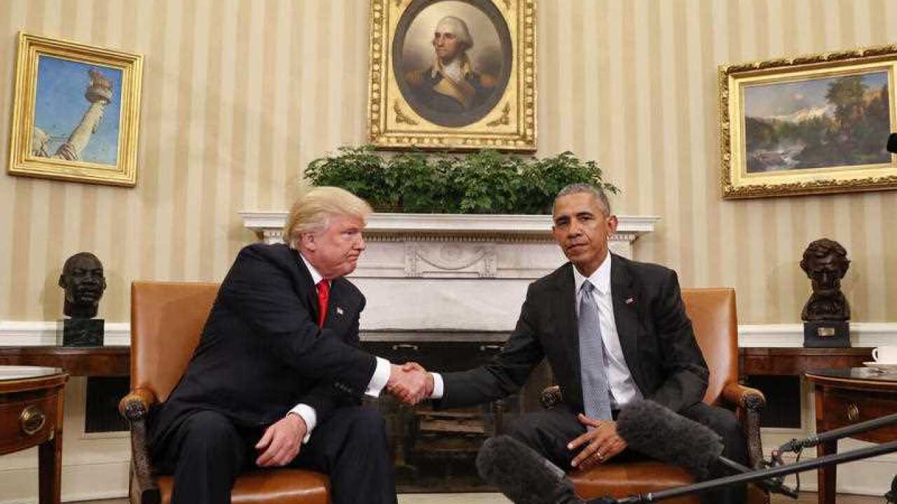 In this Thursday, Nov. 10, 2016 file photo, President Barack Obama and President-elect Donald Trump shake hands following their meeting in the Oval Office of the White House in Washington.
