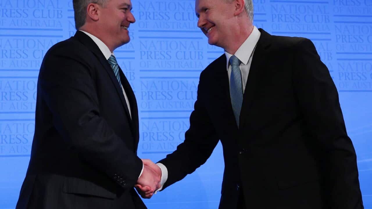 Labor finance spokesman Tony Burke (R)