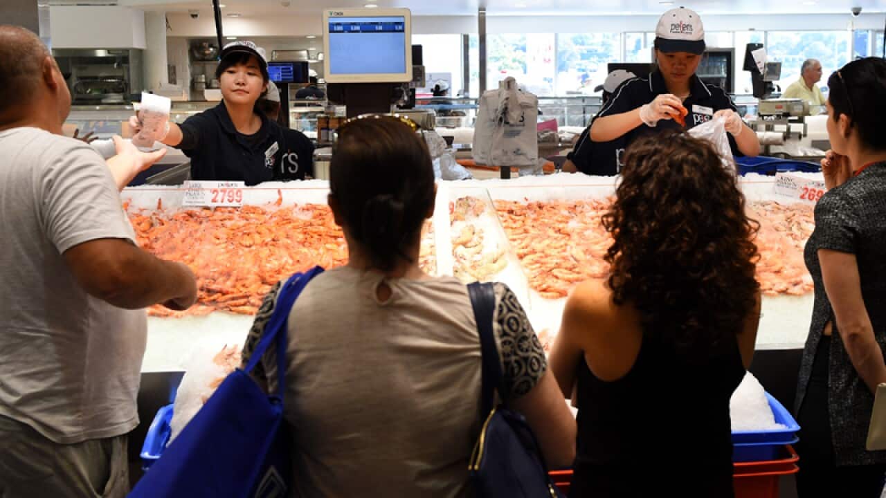 Customers are seen at the Sydney Fish Market