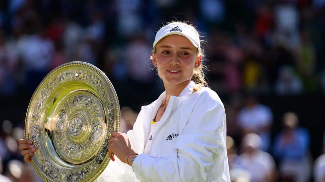Elena Rybakina of Kazakhstan celebrates her victory over Ons Jabeur of Tunisia on 9 July 2022.