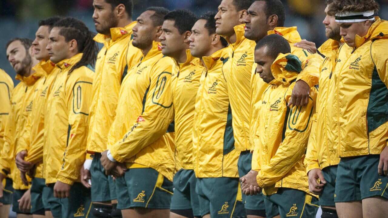 The Wallabies line up before a match