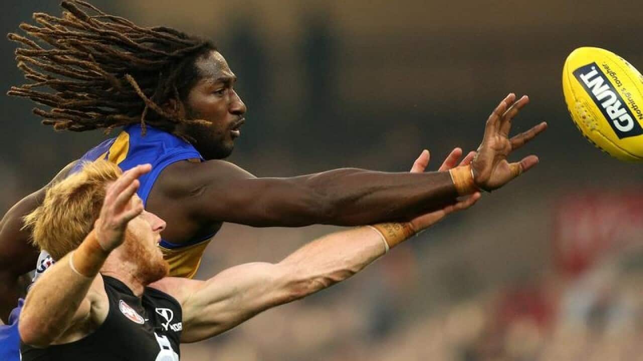 AFL player Nic Naitanui of the Eagles in action against the Blues.
