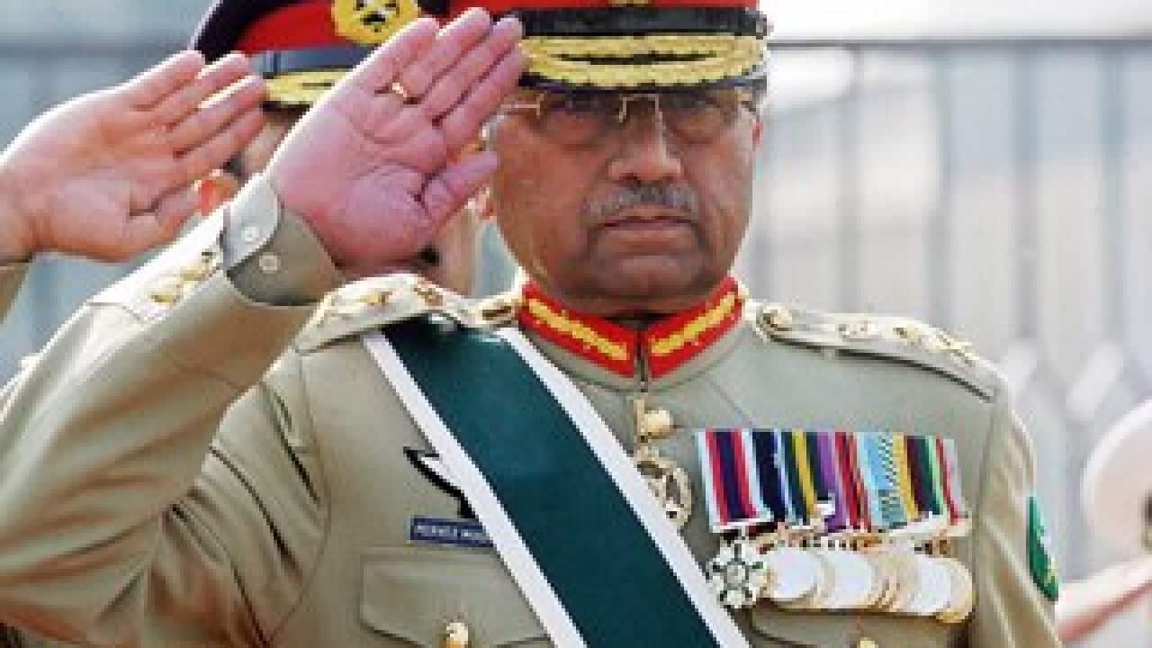 Pervez Musharraf salutes his troops on his last full day as Pakistan's army chief. (Getty Images)