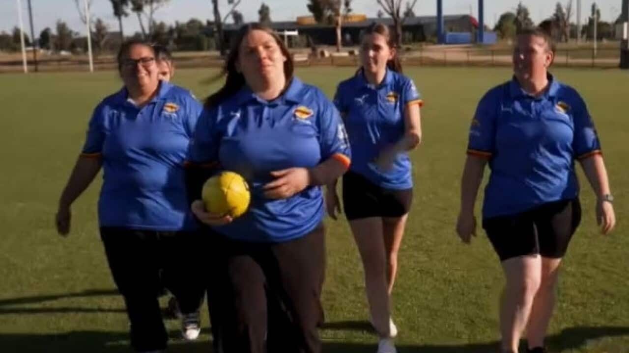 Award winner April Le Sueur (with ball) (SBS).jpg