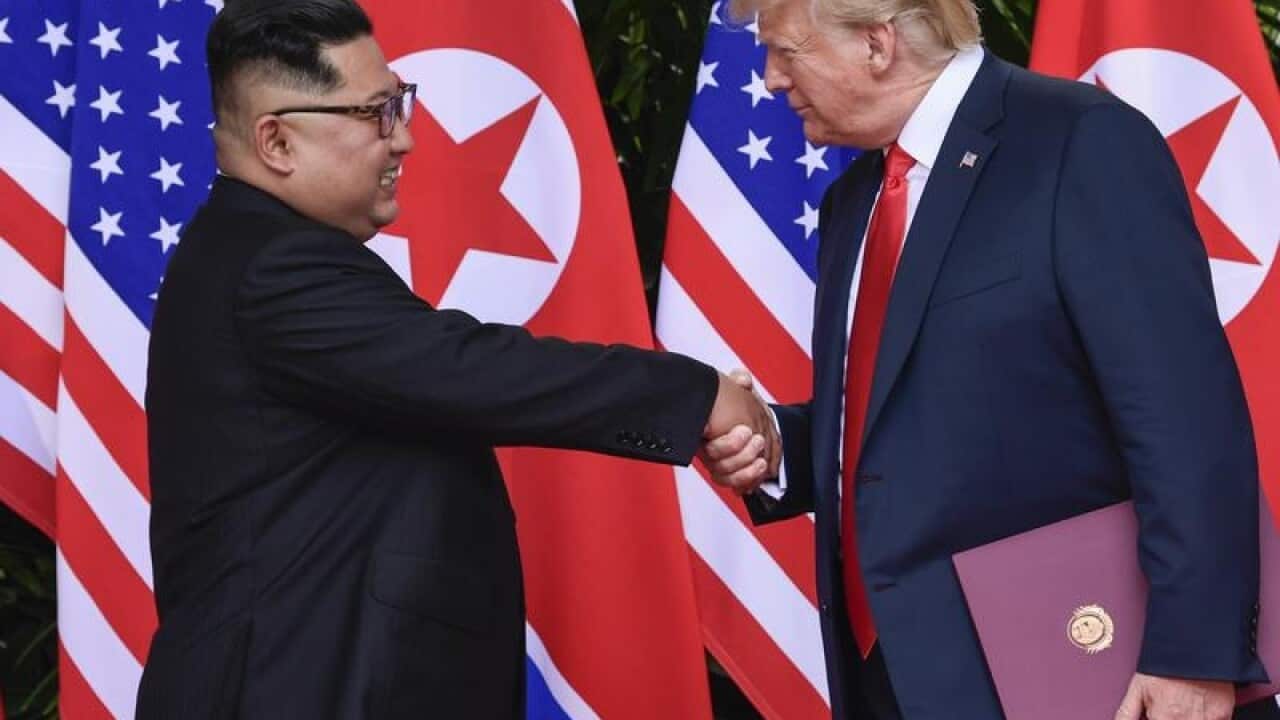 A file image of Kim Jong-un and Donald Trump at their Singapore summit