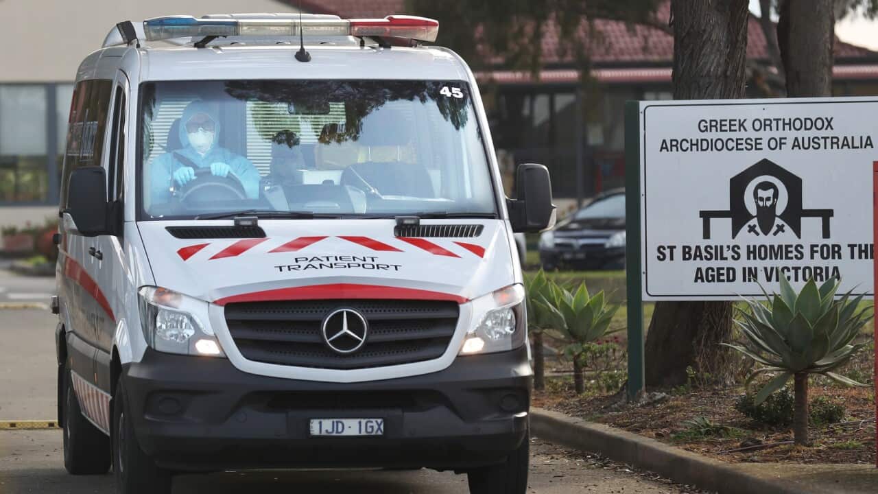 Medical staff preparing to transport people from the St Basils Home, 2020.