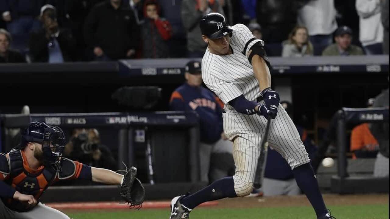 New York Yankees' Aaron Judge hits an RBI double.