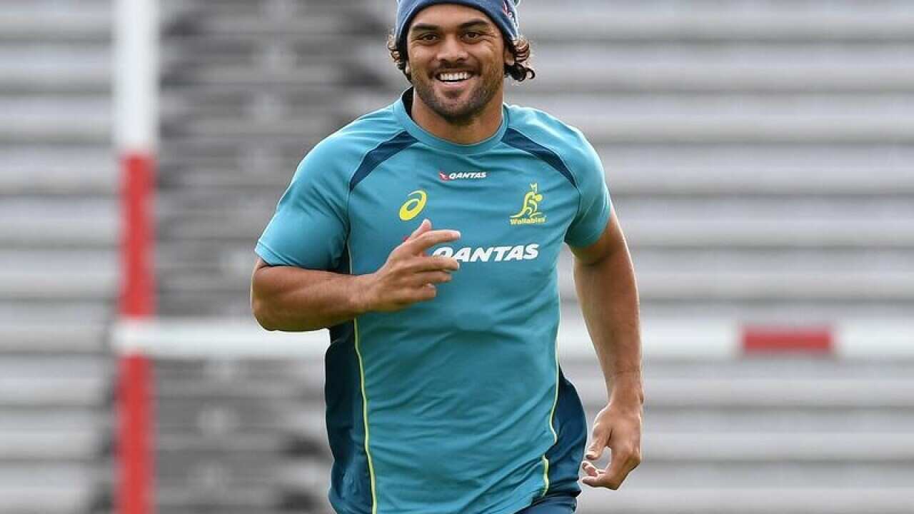 Karmichael Hunt smiles during a training session
