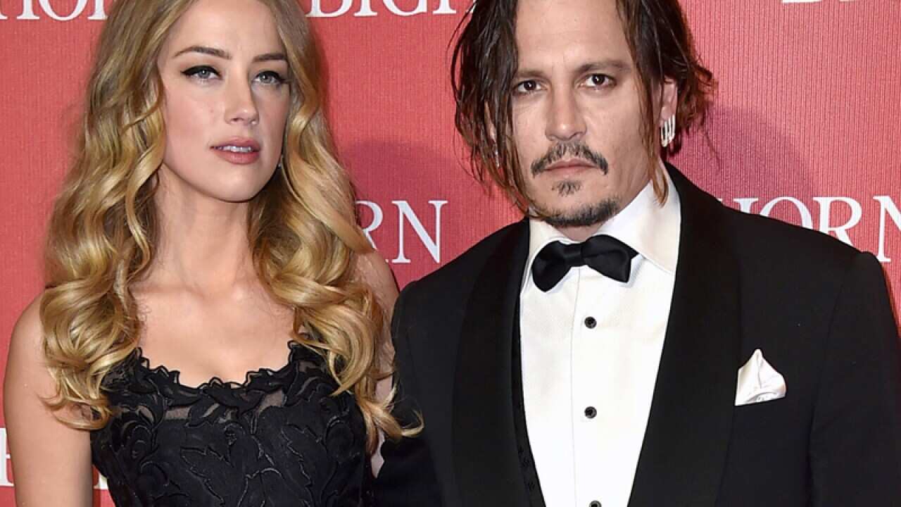 Amber Heard, left, and Johnny Depp
