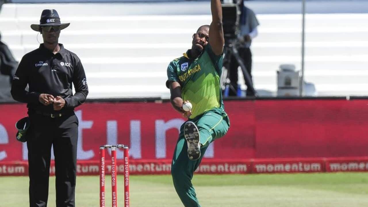 South Africa bowler Andile Phehlukwayo (R)