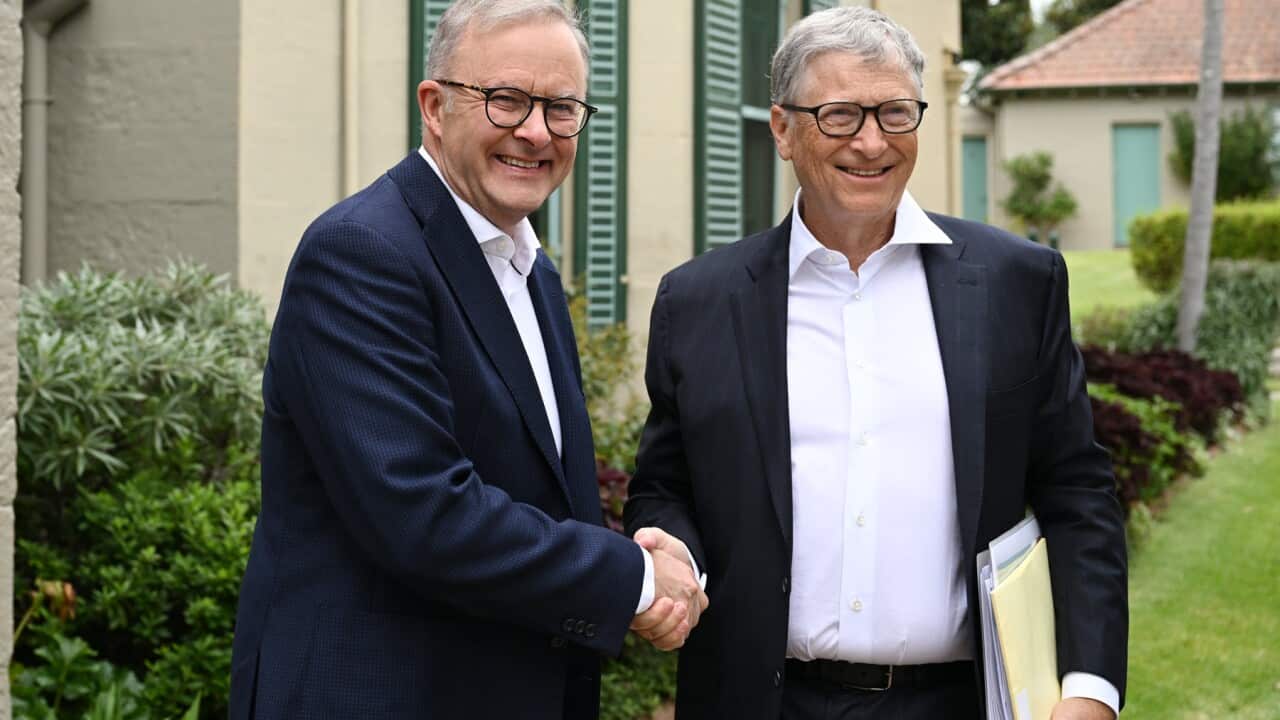 Anthony Albanese and Bill Gates pose for a photo and shake hands in Sydney