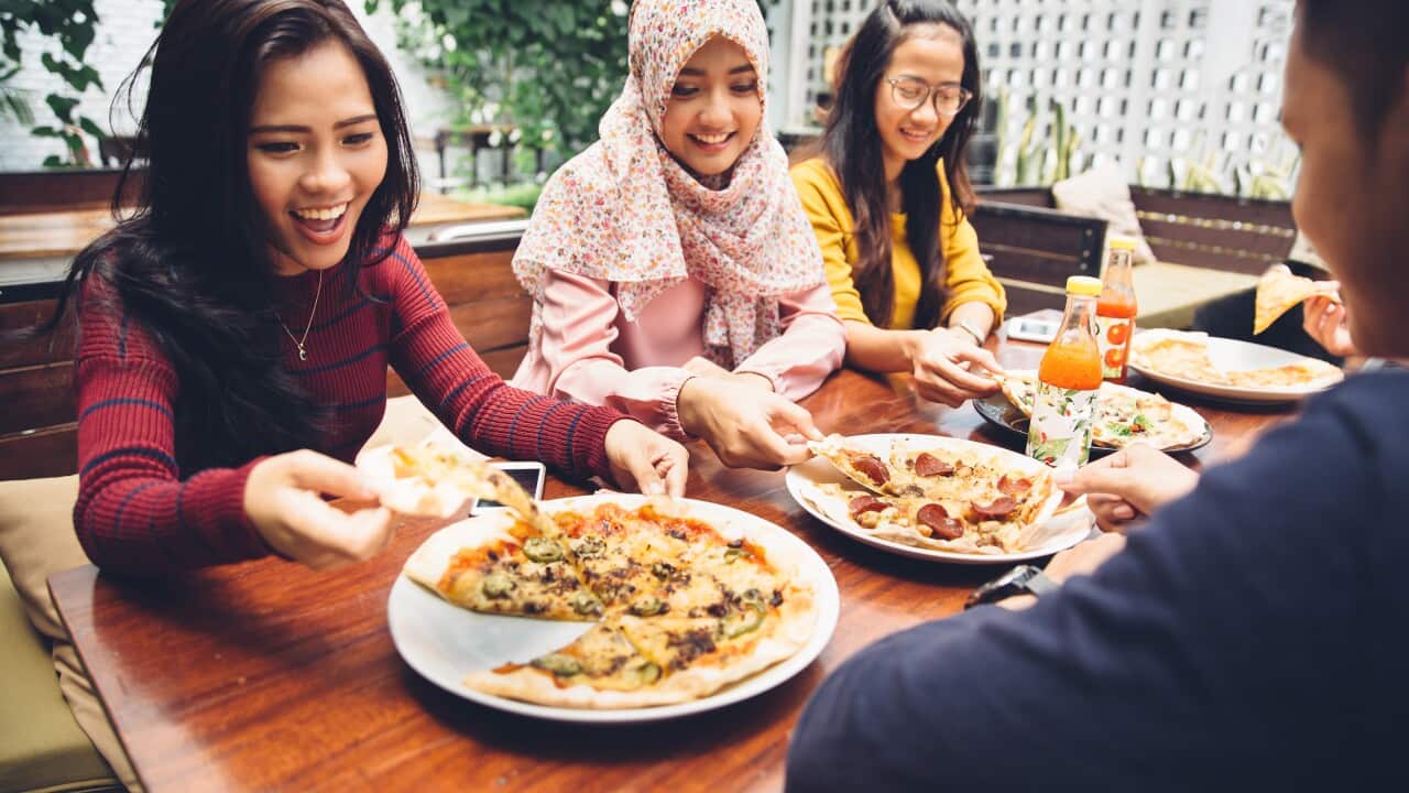 Friends dining out together