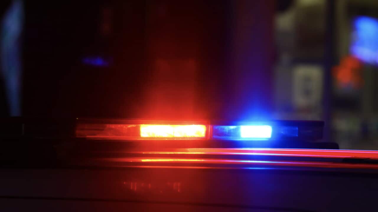 Police lights in the dark.