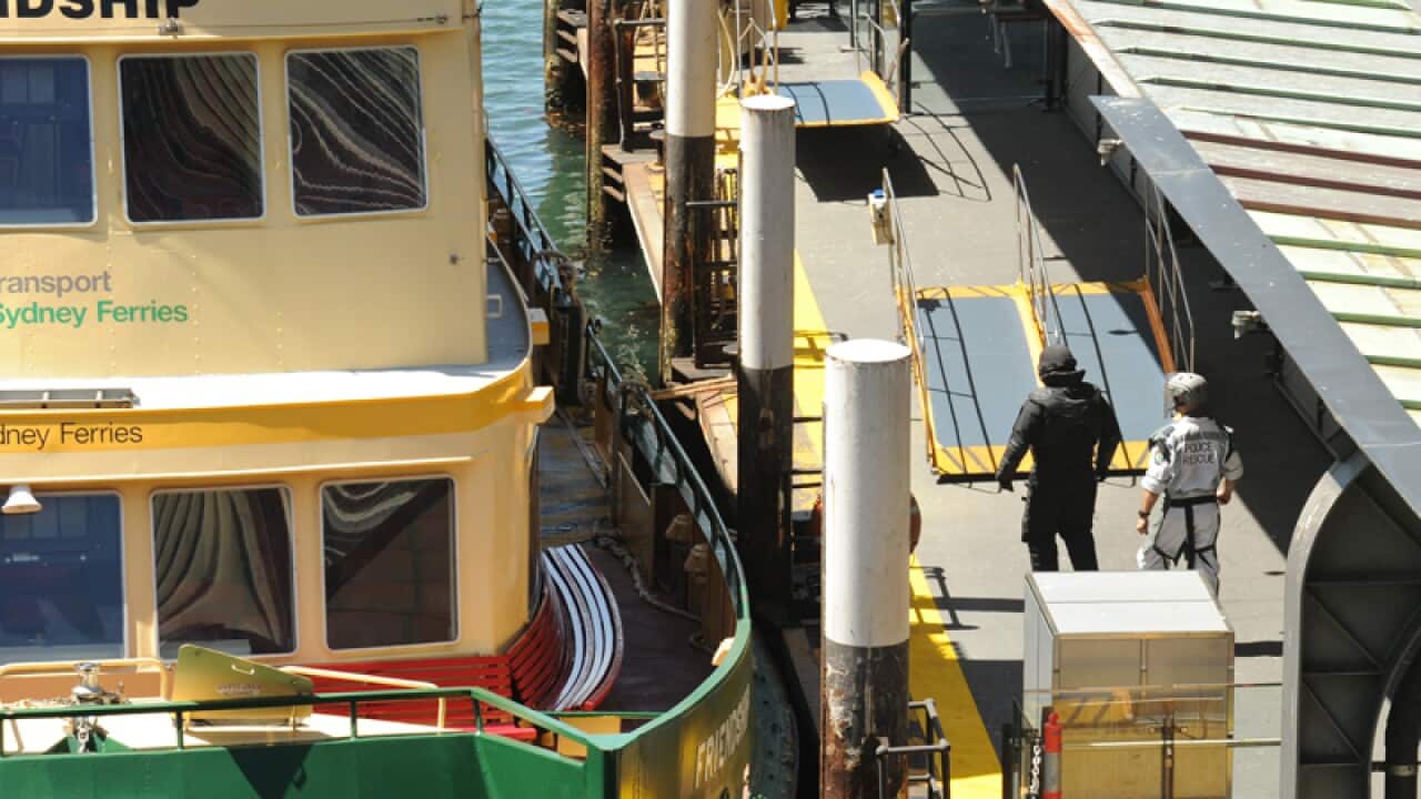 Police board a boat with a suspicious package on board in Sydney