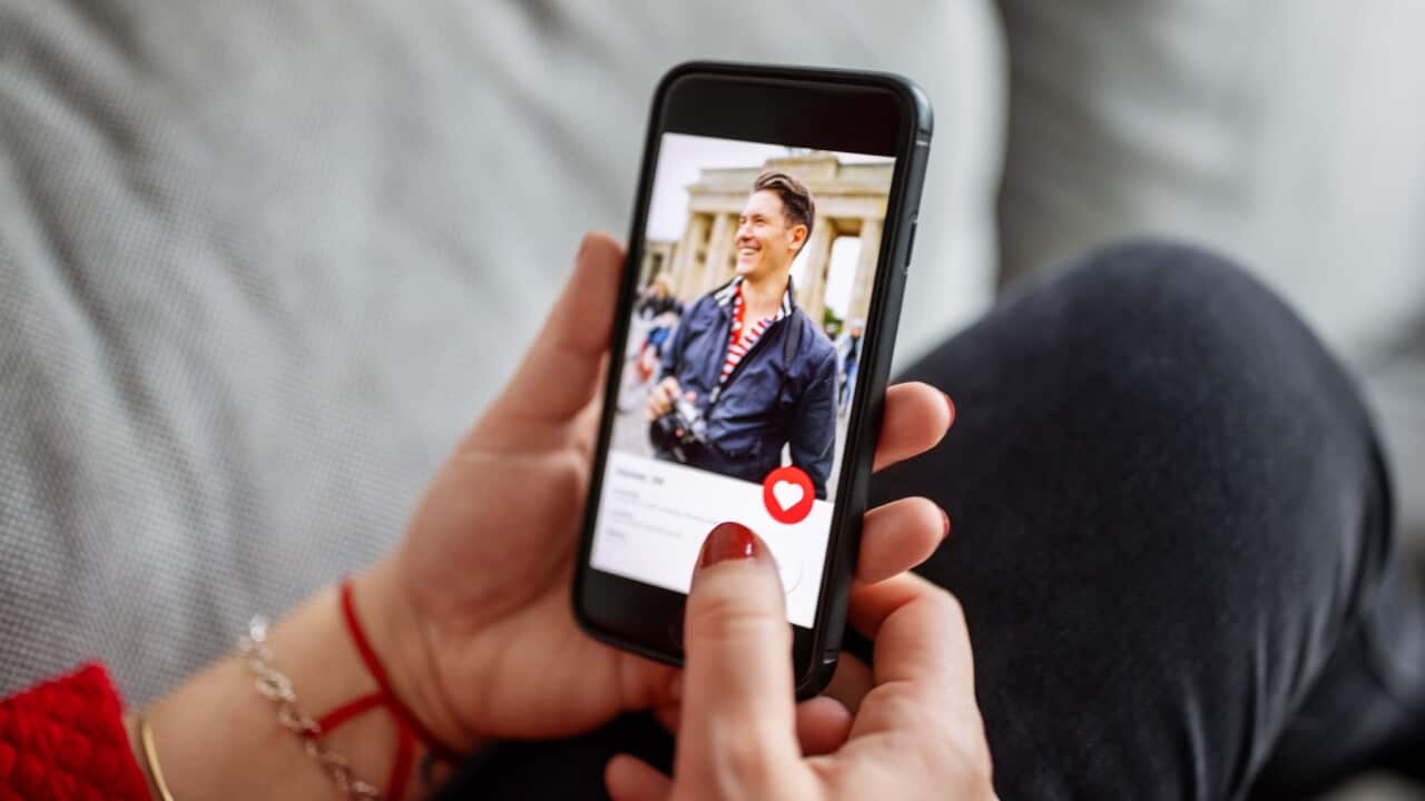 Using a dating app (Getty)
