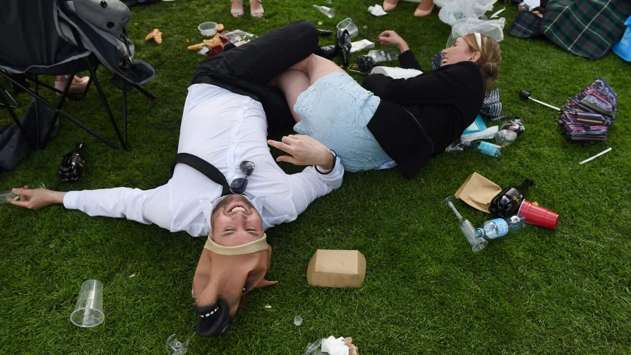 Revellers at the end of Derby Day, part of the Melbourne Cup festival, in 2014.