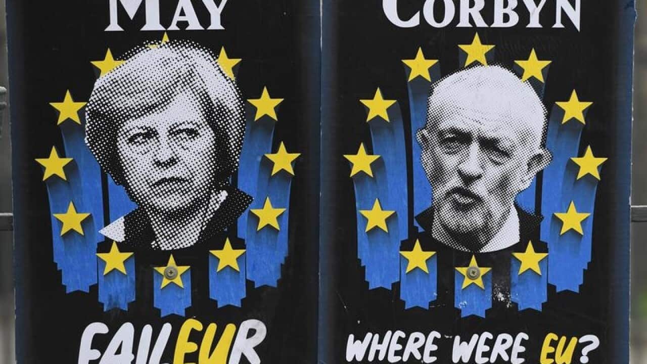 Posters mocking Theresa May and Jeremy Corbyn in Westminster