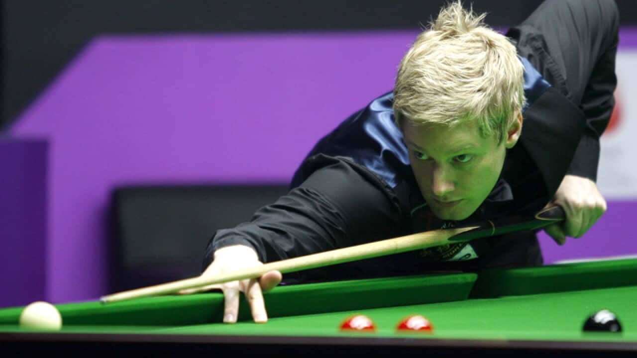 Neil Robertson (pic) of Australia plays a shot against Alex Davies