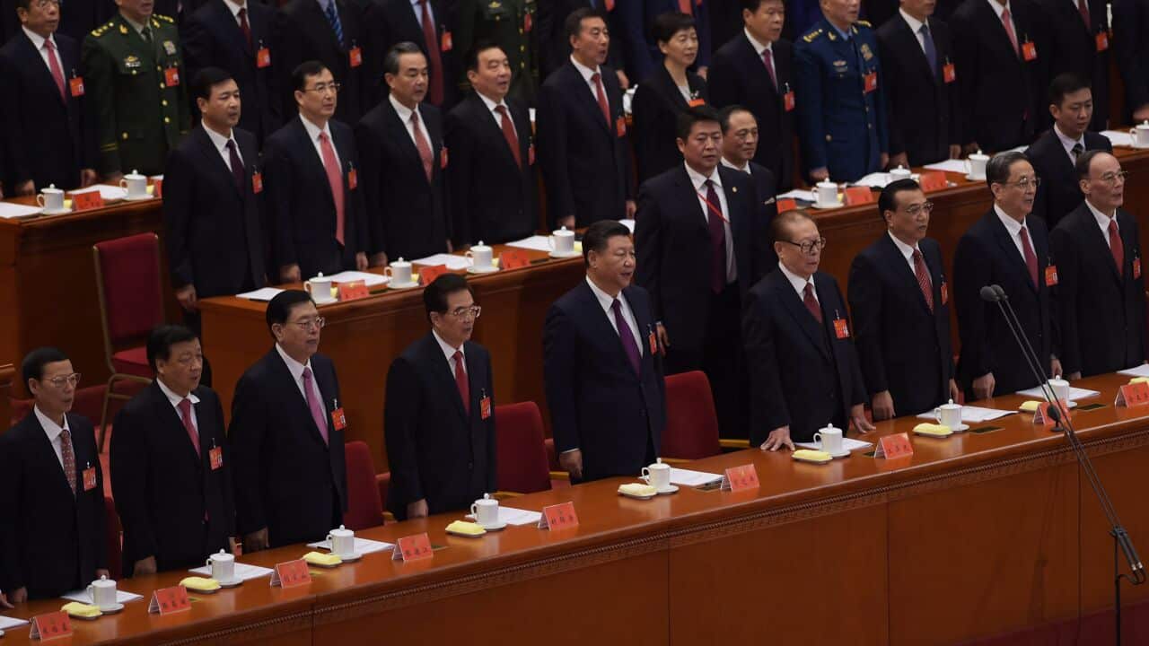 Xi Jinping (C) sings the National Anthem with Chinese leaders during the opening of the 19th Communist Party Congress at the Great Hall of the People in Beijing