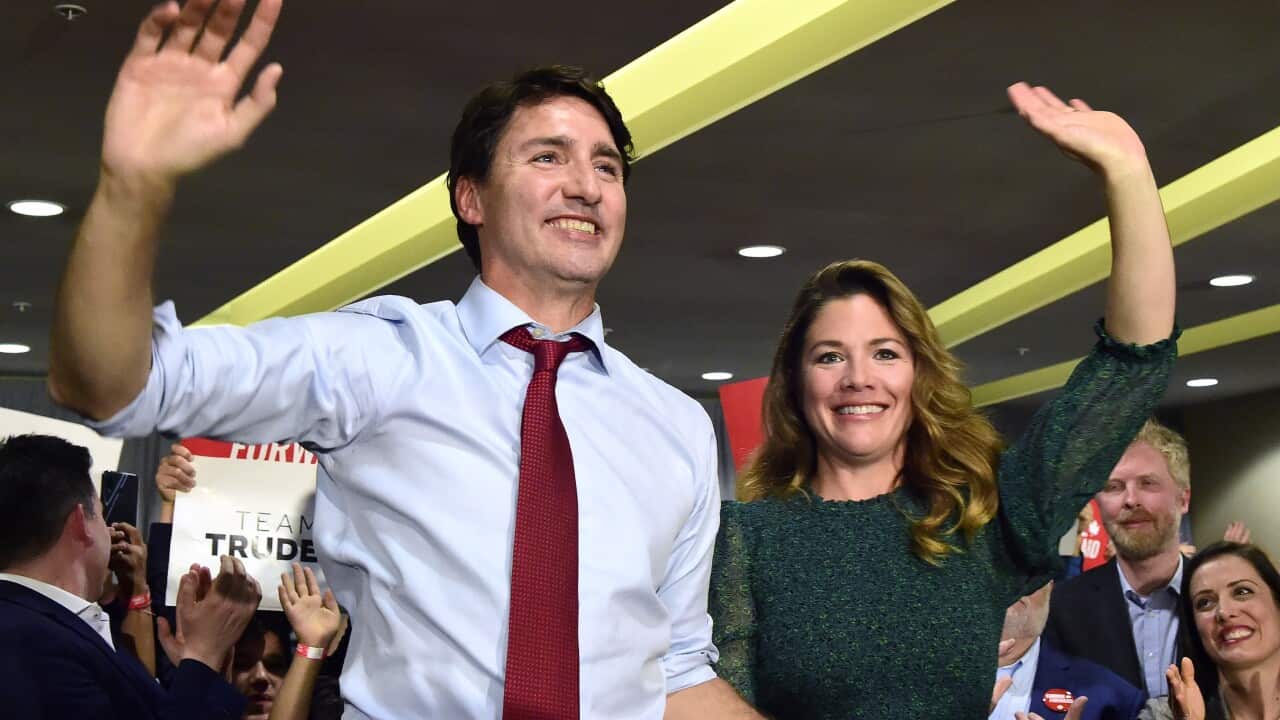 Leader of the Liberal Party of Canada, Justin Trudeau, left, and his wife Sophie Gregoire Trudeau attend a rally in Burnaby, British Columbia, on Friday, Oct. 11, 2019. (Frank Gunn/The Canadian Press via AP)