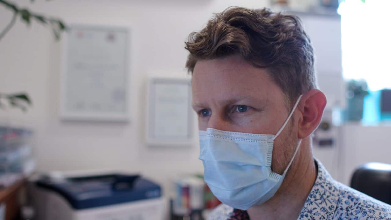 A Doctor wearing a mask in his clinic in the Northern Rivers region of New South Wales