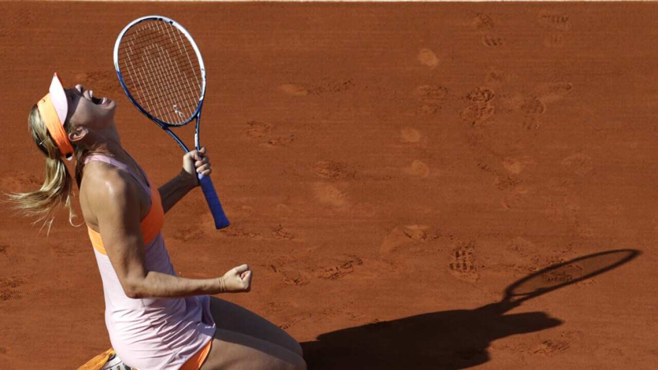 Russia's Maria Sharapova celebrates after winning
