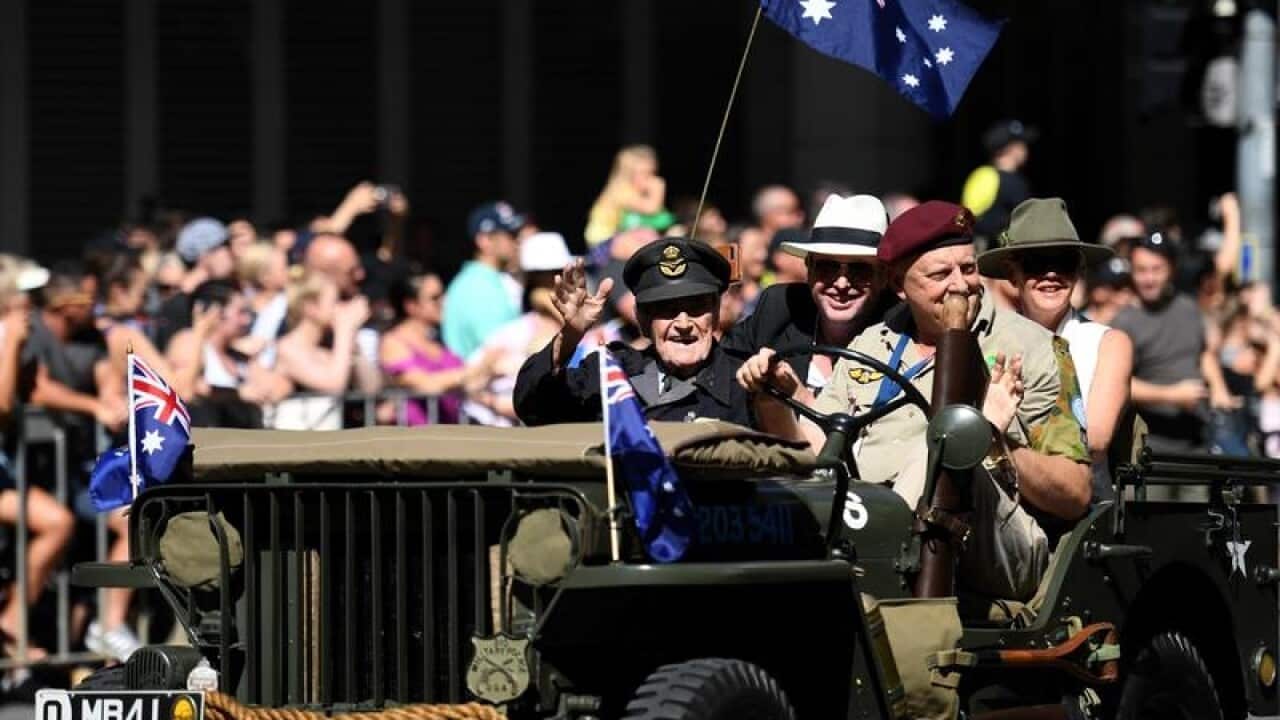 War veterans take part in an Anzac Day parade in Brisbane.