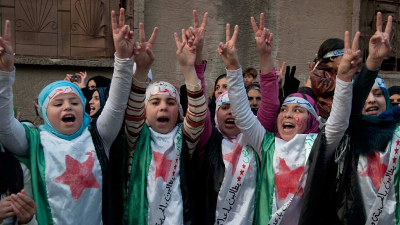 homs_syria_protest_girls_111229_B_AAP_731178303