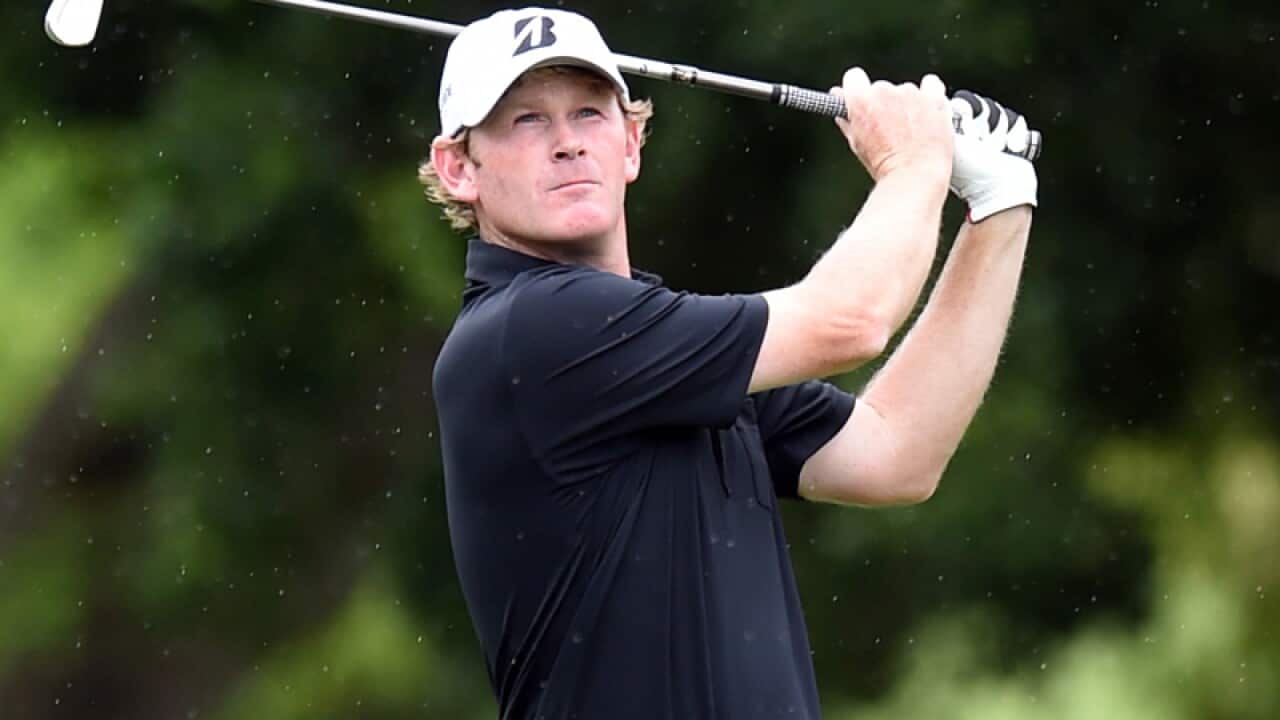 American golfer Brandt Snedeker plays a shot